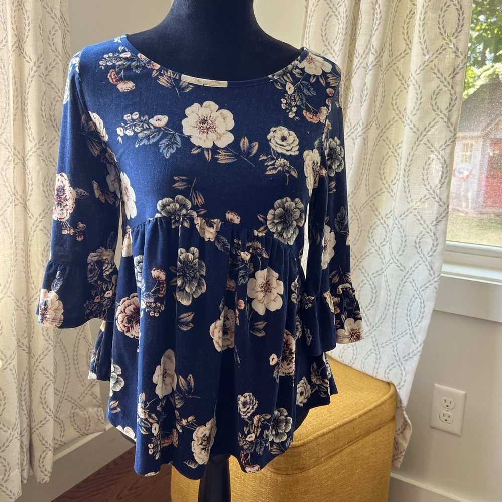 Flower 3/4 sleeve peplum top